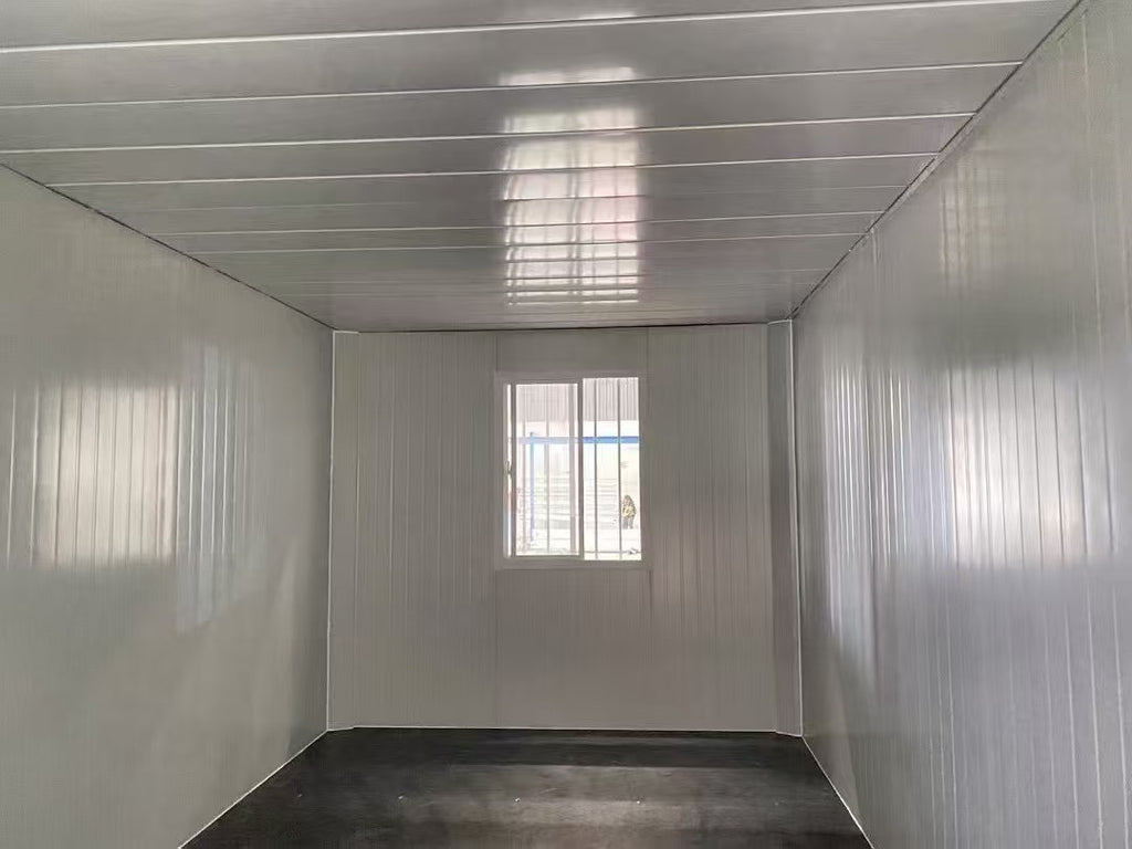 Empty metal storage container with a window