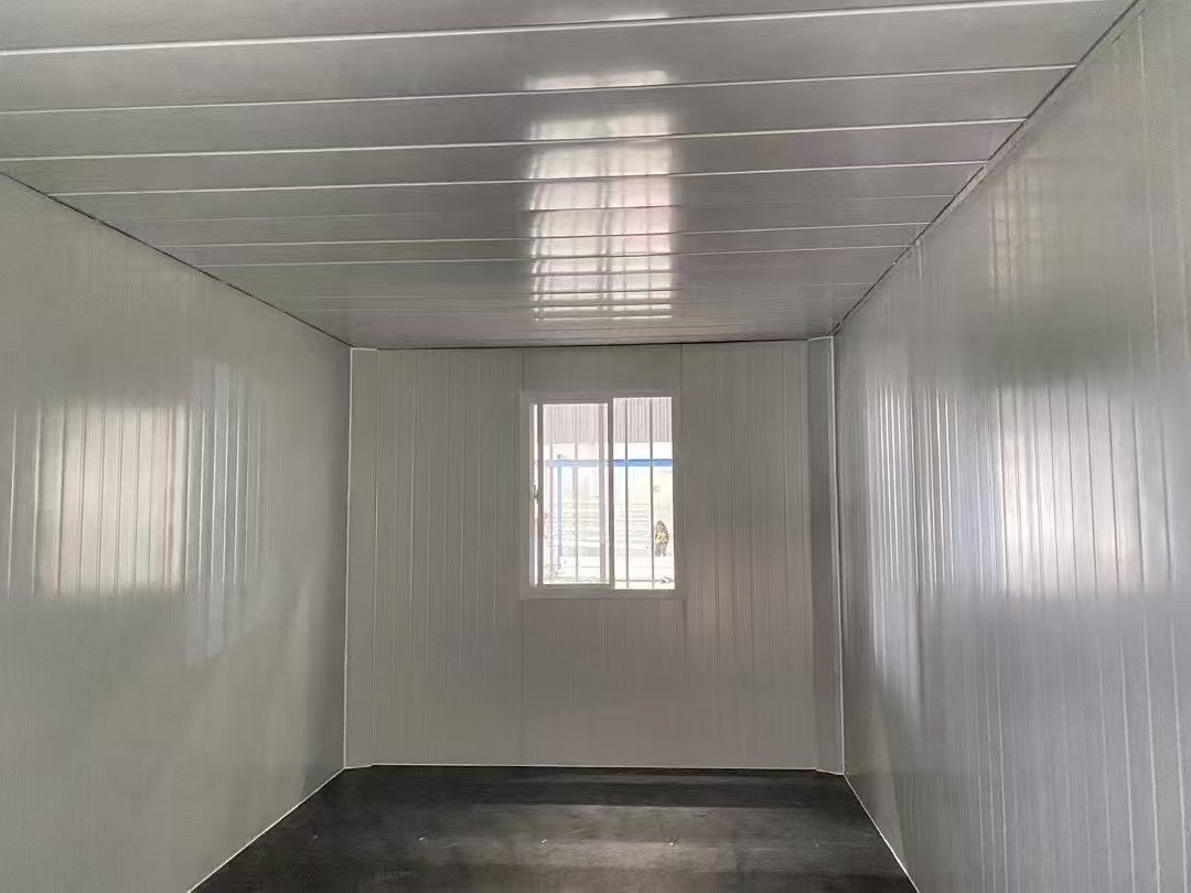 Empty metal storage container with a window